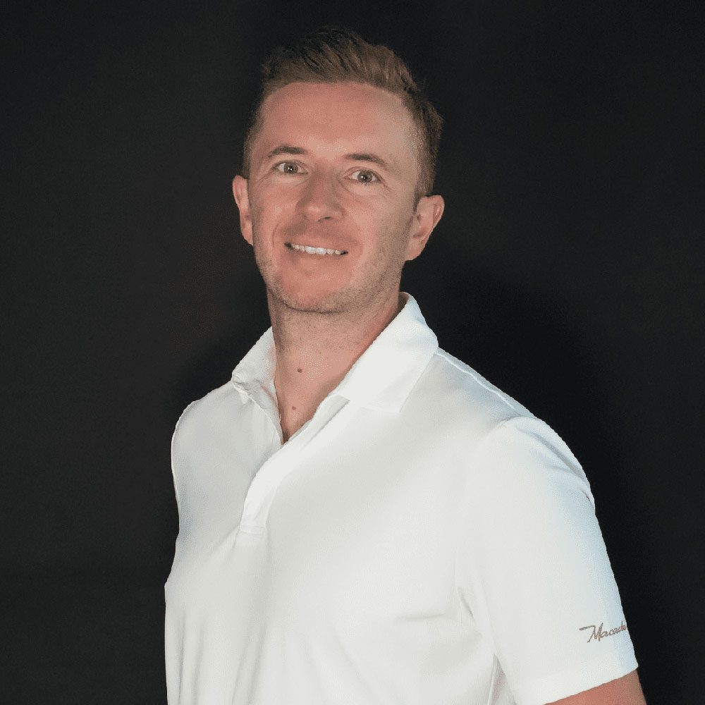 photo showing an HIO employee in a white polo