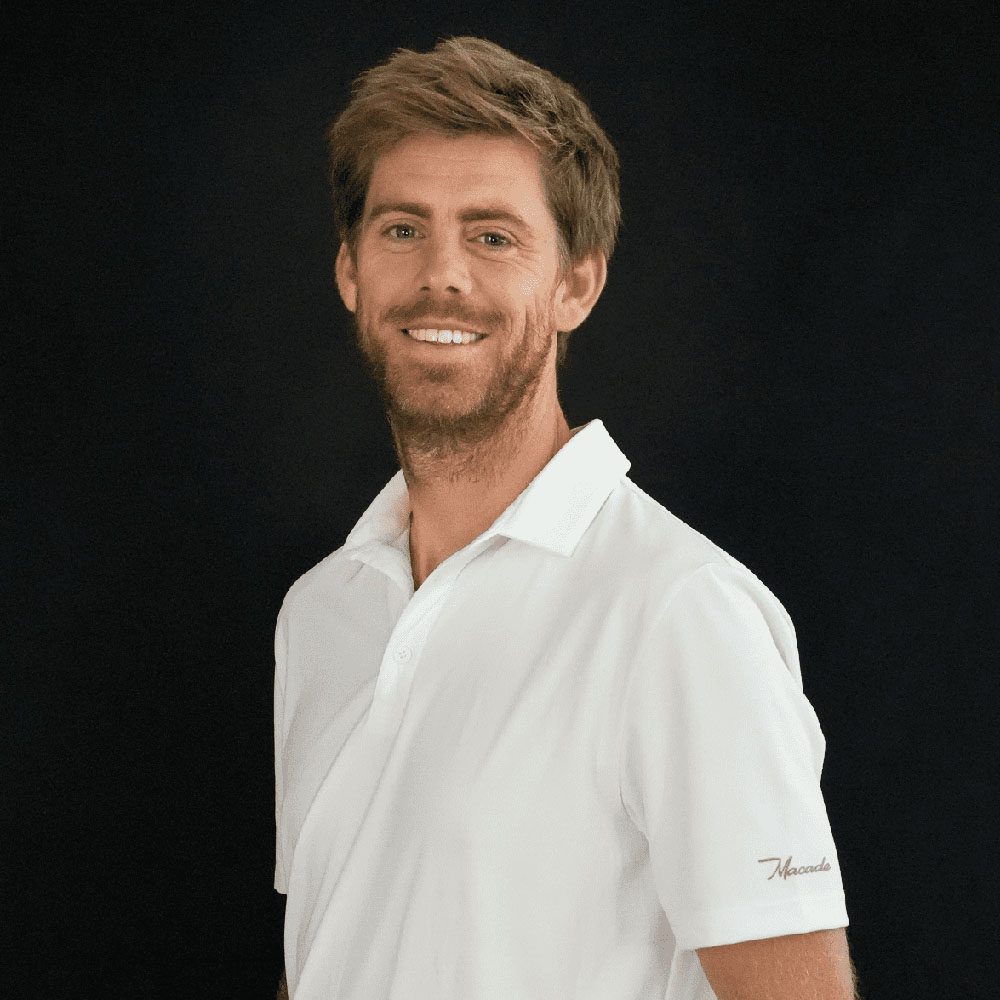 photo showing an HIO employee in a white polo