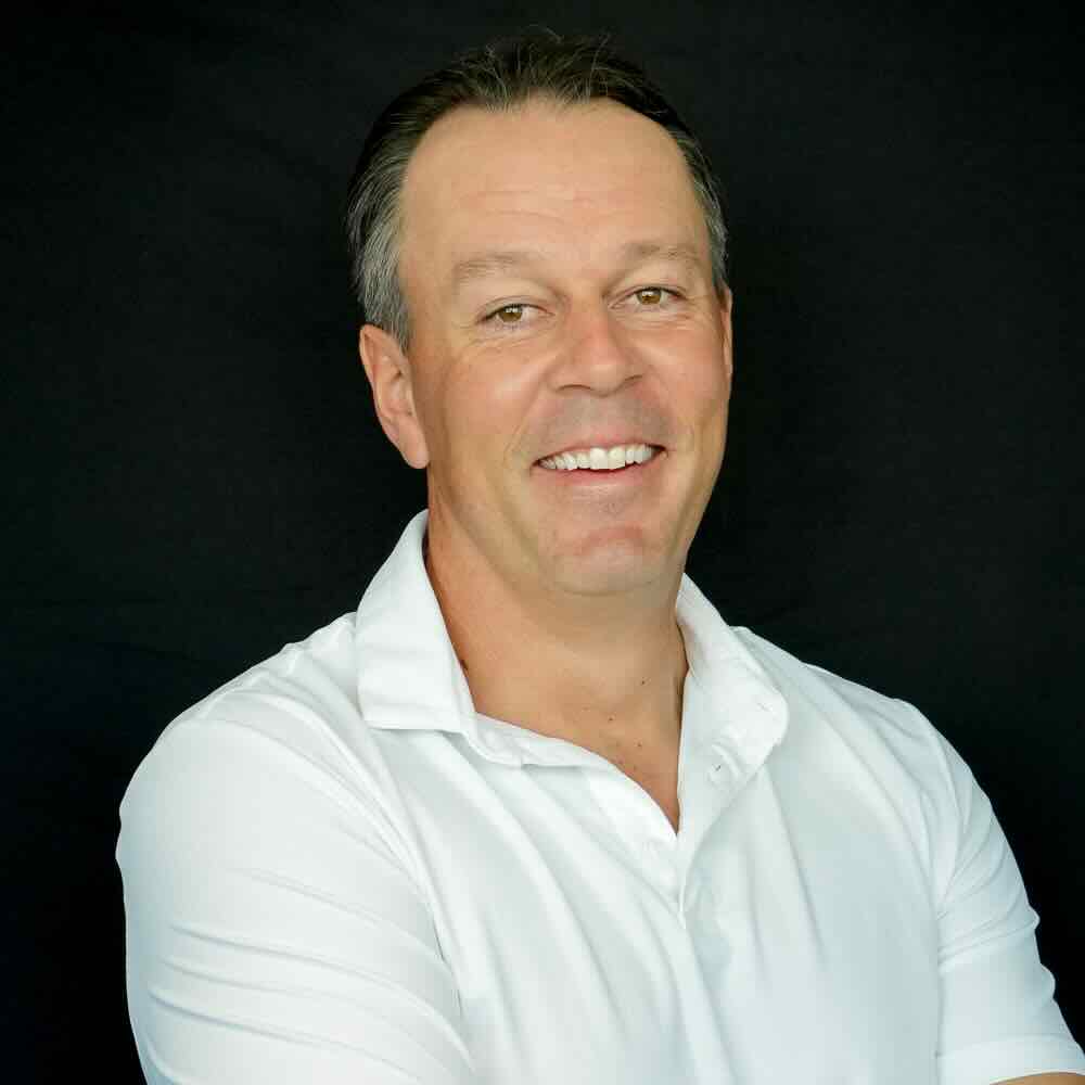 photo showing an HIO employee in a white polo